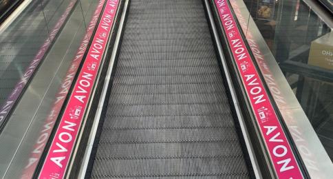 TRAVELATOR INTERIOR BRANDING (STRIPS)
